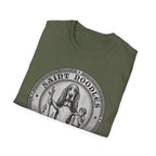 Saint Noodles Guide Us T-Shirt folded flat lay in military green, showing the 'Saint Noodles' medallion graphic with a basset hound holding a staff with a fish.