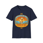 Believe in the Power of Dog Yellow Lab T-Shirt in navy, flat lay view showing a retro-style oval badge with a halo-wearing yellow Labrador running joyfully through a sunlit field, with the words 'Joy Loyalty Love' and crossed bones.