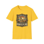 Believe in the Power of Dog T-shirt flat lay in gold yellow, featuring a vintage ornate badge graphic of a Labrador standing on a rocky mountain outcrop at sunset, with the text 'Believe in the Power of Dog' and 'Faith, Loyalty, Love'.