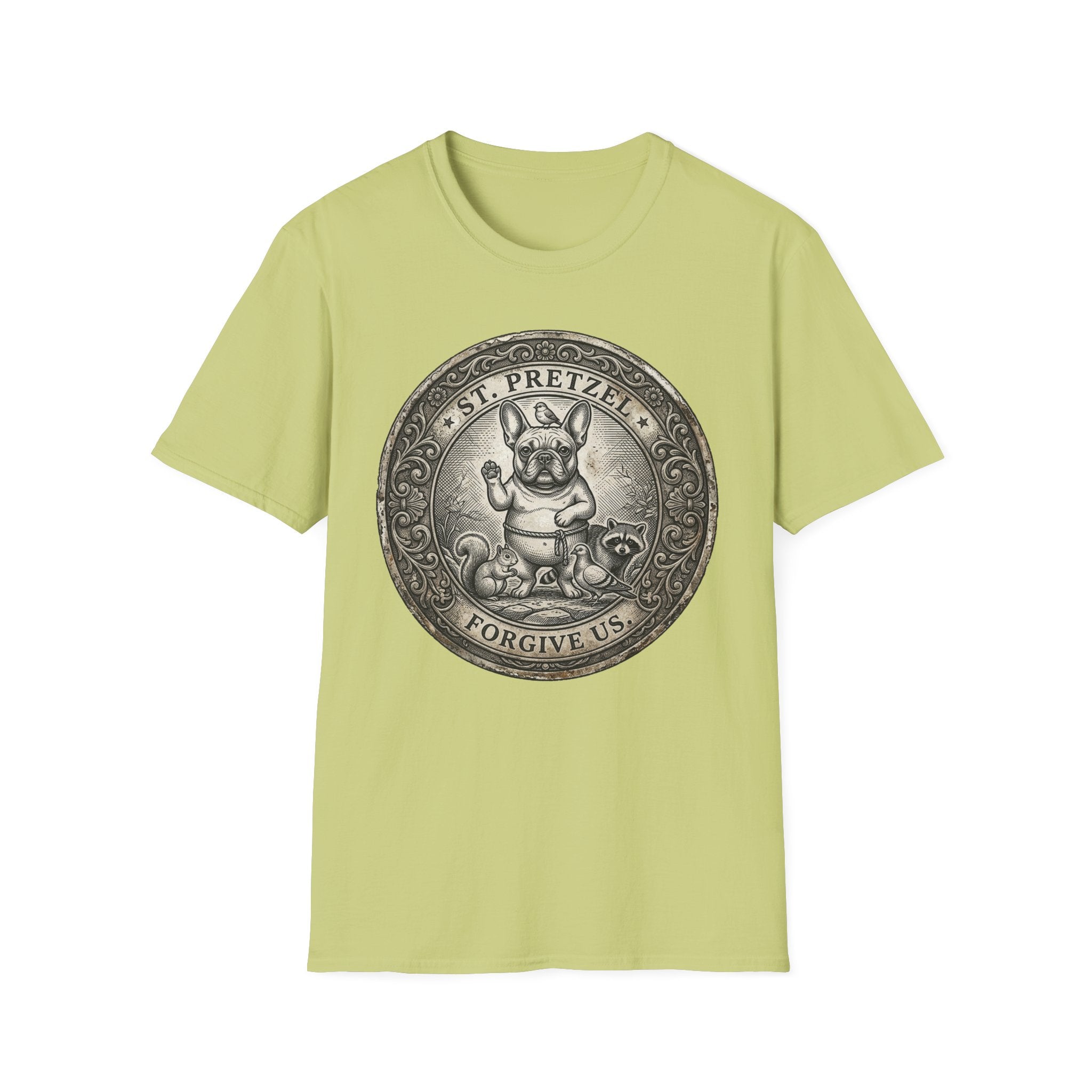 Saint Pretzel Forgive Us T-Shirt flat lay on light green shirt featuring an engraved medallion design with a French Bulldog saint and the text St. Pretzel Forgive Us.
