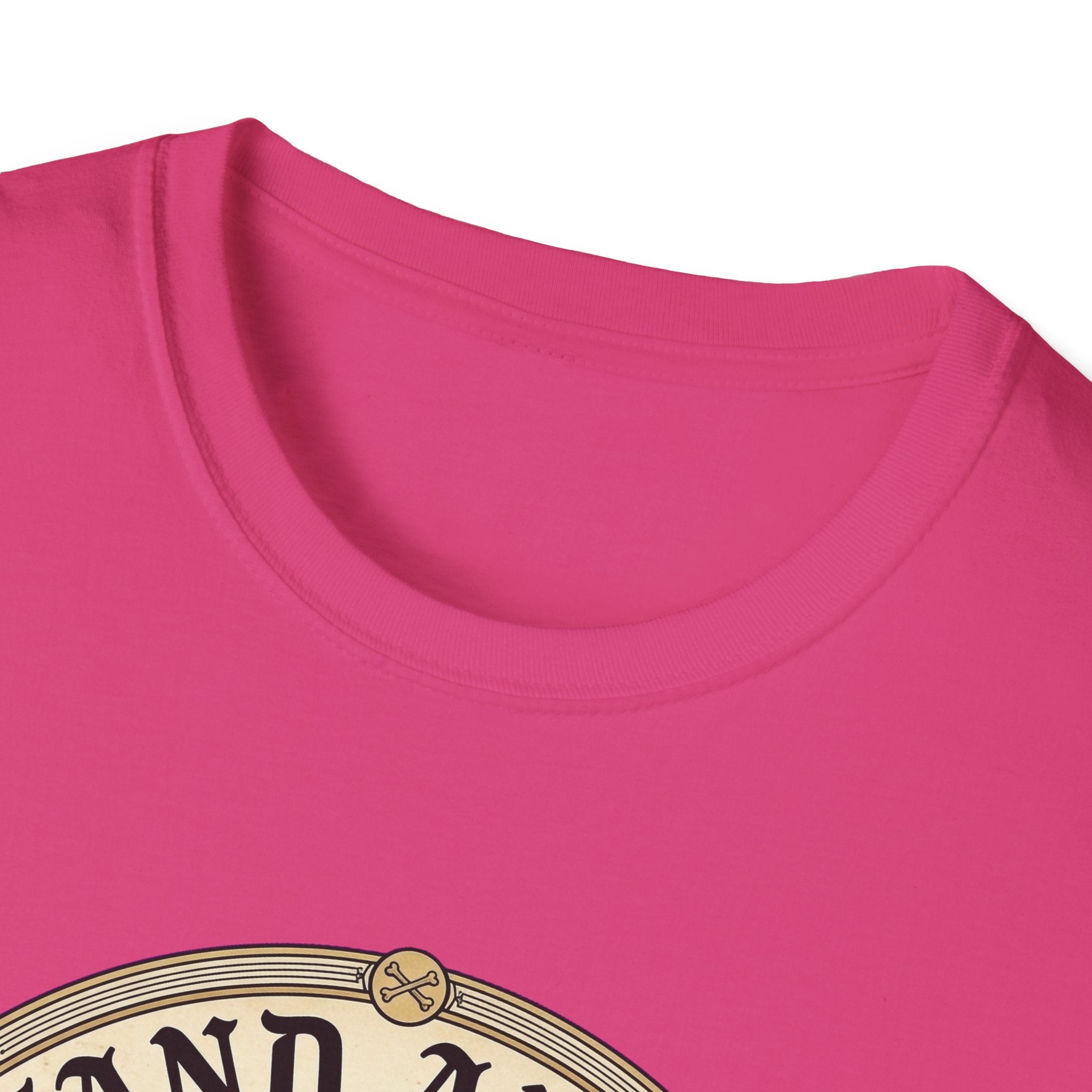 I Stand Amazed Golden Retriever T-Shirt close-up of the neckline on a heliconia pink shirt, showing the top arc of the circular golden retriever graphic.
