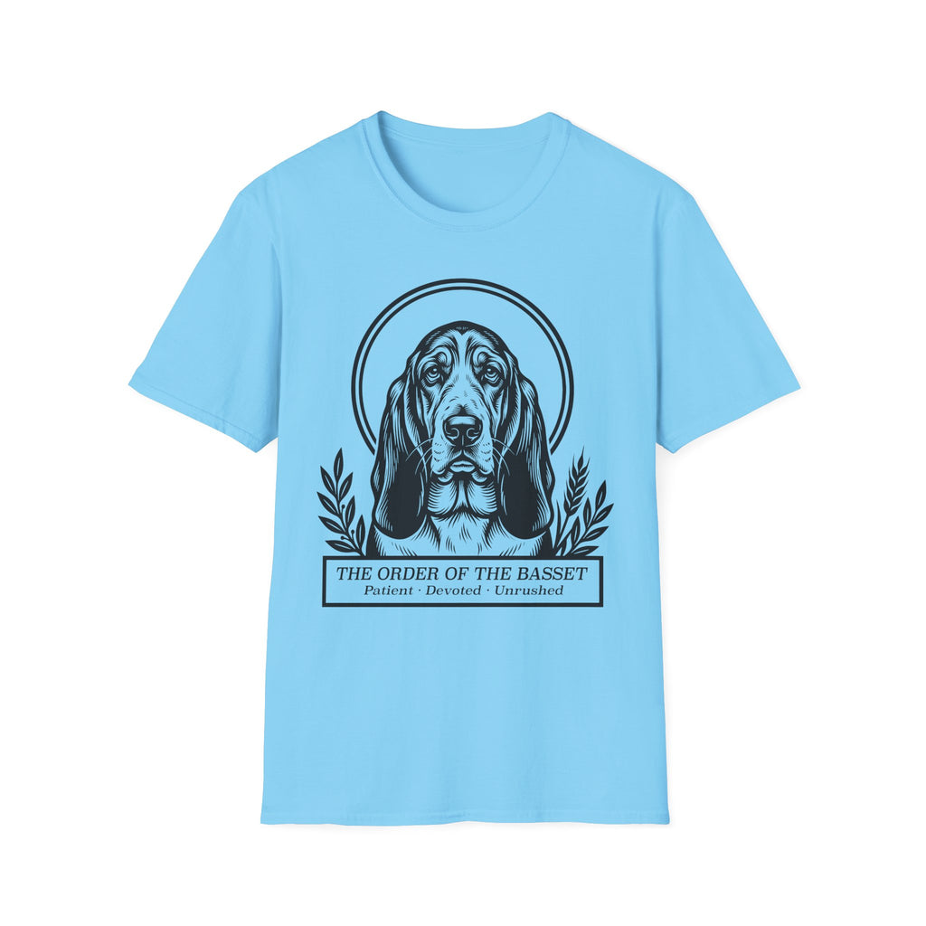 Holy Orders | Basset Hound T-Shirt flat lay on navy shirt featuring a stained glass style illustration of a Basset Hound depicted as a holy figure with a golden halo and the text 'Holy Orders.'