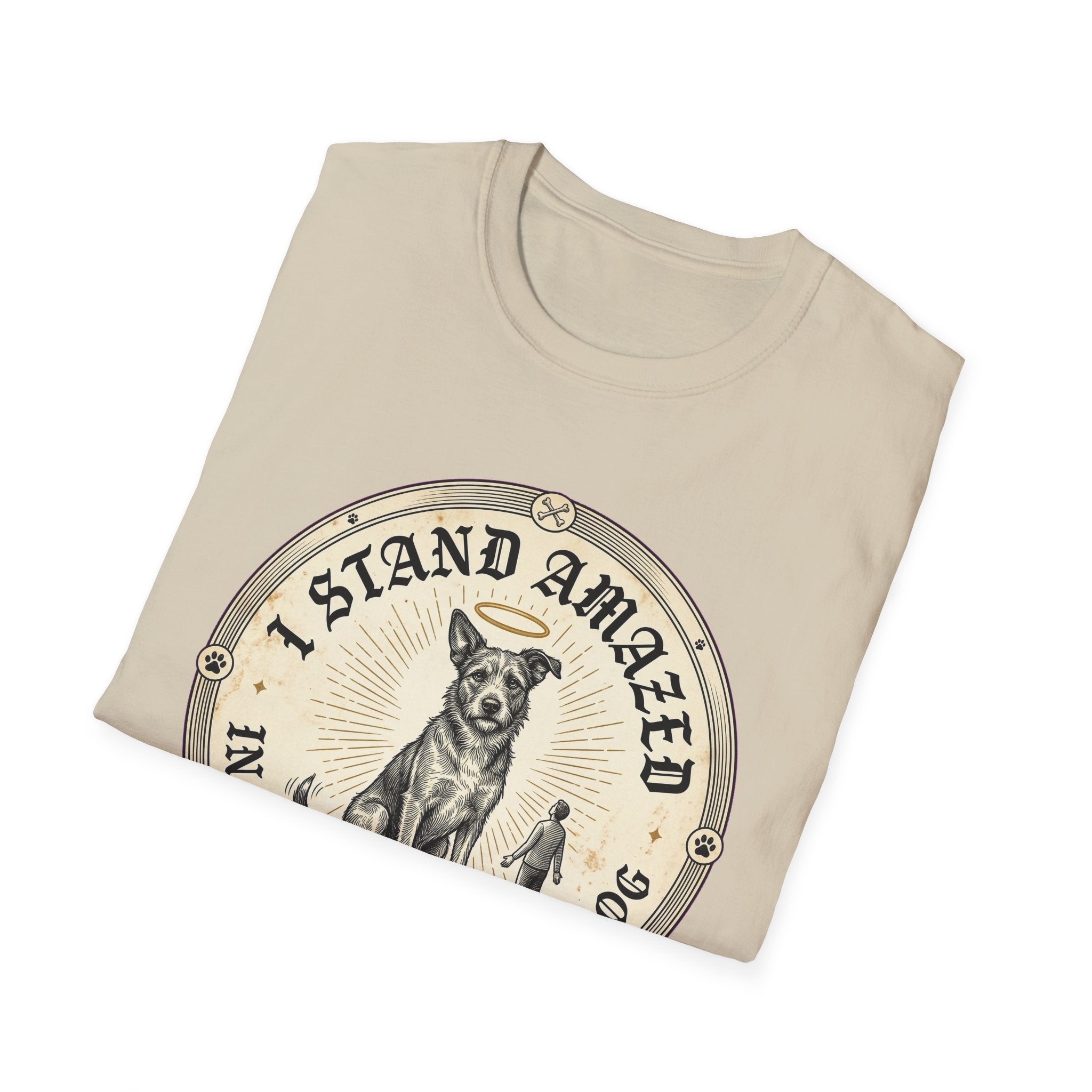 I Stand Amazed Rescue Mutt T-Shirt in sand, folded view showing the front graphic of the rescue mutt design with halo and 'I Stand Amazed' text.