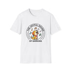 The Joyful Sound of Barking T-shirt flat lay, white shirt featuring a circular badge graphic of a cartoon yellow dog with a red bandana howling joyfully with musical notes and the text 'The Joyful Sound of Barking.'
