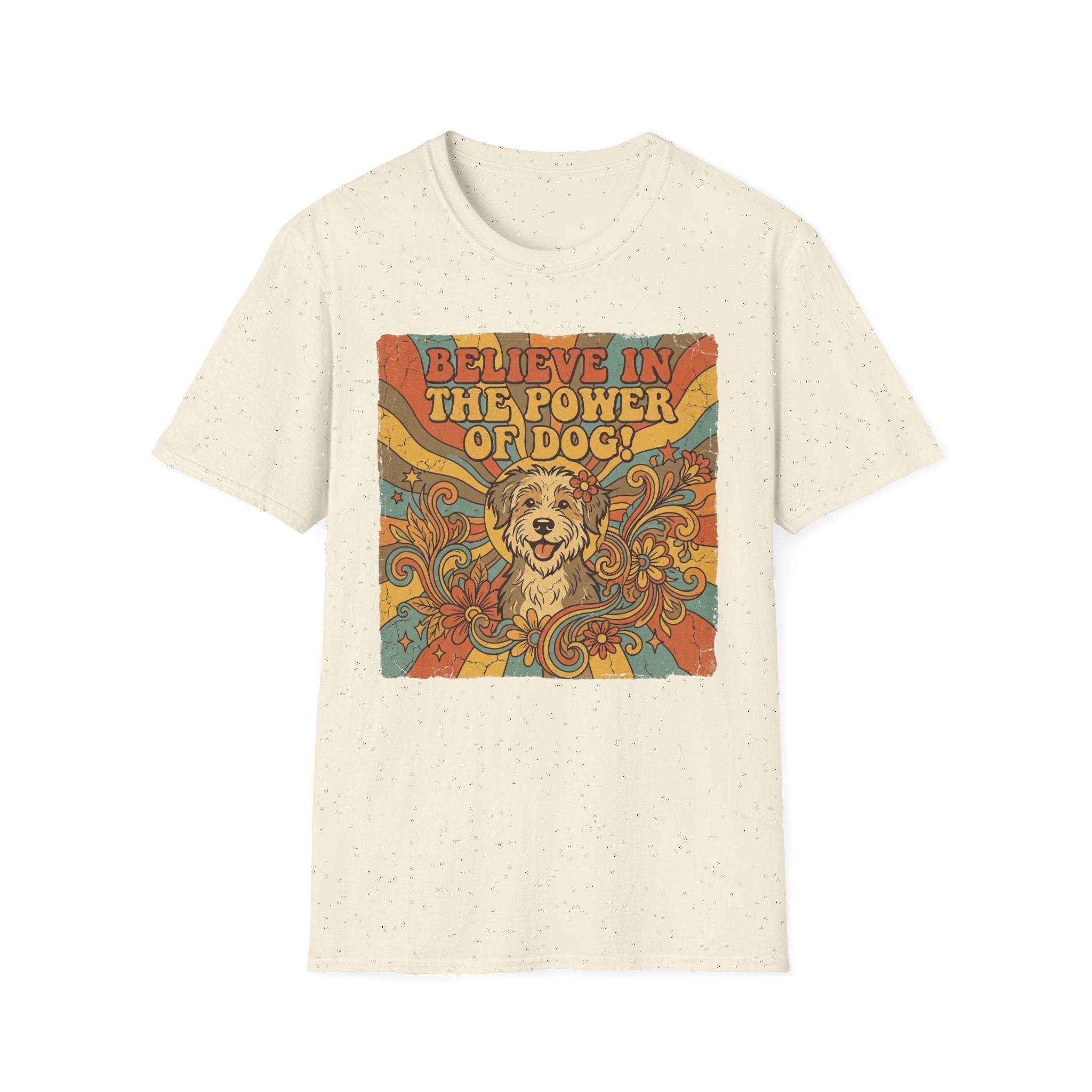 Believe in the Power of Dog Retro T-Shirt flat lay in natural cream, featuring a vintage 70s-style graphic of a fluffy dog face surrounded by swirling florals and rainbow rays with groovy lettering.