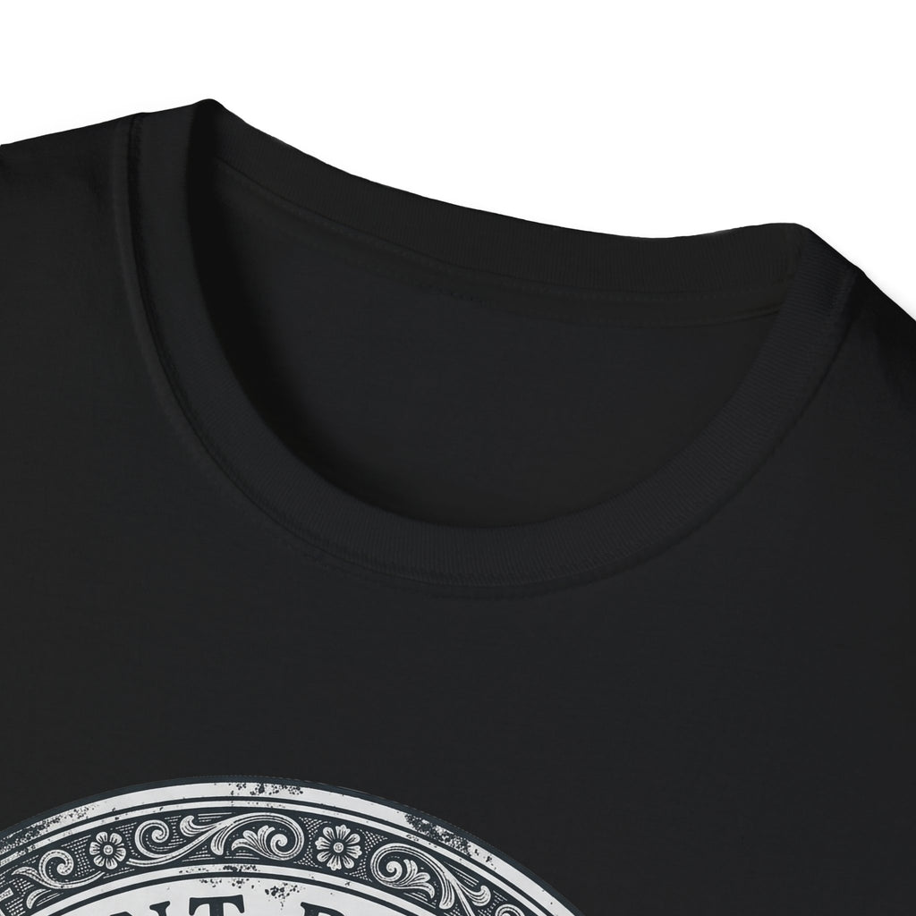 Saint Biscuit Heal Us T-shirt close-up detail on black shirt showing the ornate circular border and 'Saint Biscuit' text of the vintage medallion graphic.