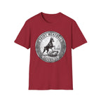 Saint Meatball Defend Us T-Shirt flat lay on crimson red shirt featuring a vintage medallion design with a Doberman Pinscher saint and the text Saint Meatball Defend Us.