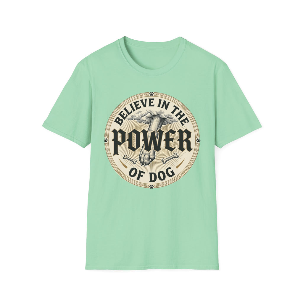 Believe in the Power of Dog Paw T-shirt flat lay in mint green, featuring a circular vintage badge graphic of a dog paw raised like a fist from clouds above crossed bones, with paw print accents and bold text.