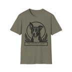 Holy Orders | Lobo T-Shirt flat lay on black shirt featuring a stained glass style illustration of Lobo, a black-coated dog with a white blaze and large upright ears, depicted as a holy figure with a golden halo and the text 'Holy Orders.'