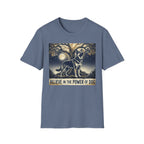 Believe in the Power of Dog German Shepherd T-shirt flat lay in heather indigo blue, featuring a vintage-style illustration of a German Shepherd standing under a moonlit tree with the text "Believe in the Power of Dog."