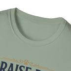 Praise Dog From Whom All Blessings Flow Golden Retriever T-Shirt close-up detail of the collar area on a sage green shirt, showing paw print and scroll accents of the Praise Dog graphic.
