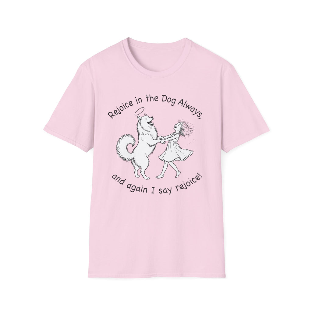 Rejoice in the Dog Samoyed T-Shirt in light pink, flat lay mockup showing a fluffy white Samoyed with a halo dancing with a woman, line-art illustration with the text 'Rejoice in the Dog Always, and again I say rejoice!'