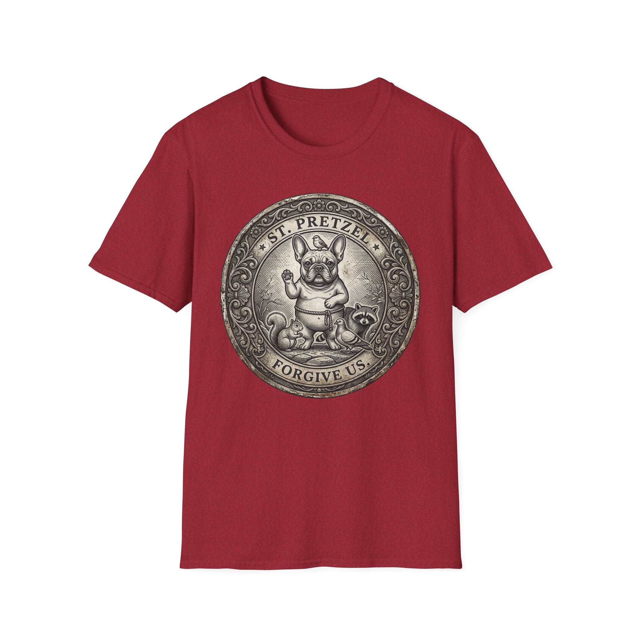 Saint Pretzel Forgive Us T-Shirt flat lay on crimson red shirt featuring an engraved medallion design with a French Bulldog saint and the text St. Pretzel Forgive Us.