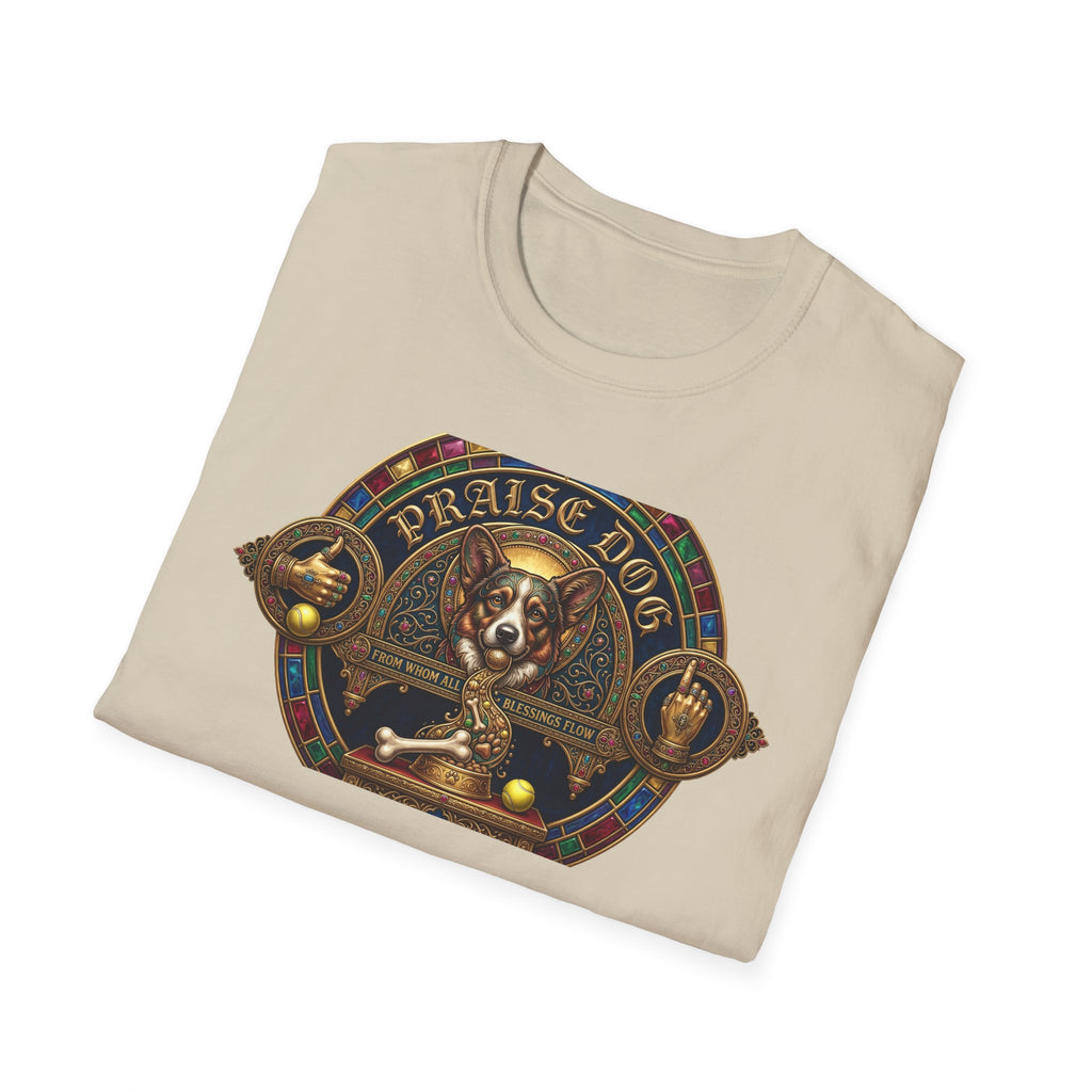 Praise Dog From Whom All Blessings Flow Corgi T-Shirt folded view in natural tan, showing the ornate stained-glass style corgi graphic with gold gothic lettering and jeweled frame.