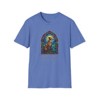 How Great Thou Bark Sight Hound T-shirt flat lay, heather blue shirt featuring a stained-glass style arched window graphic of a seated sight hound dog with a halo and the text 'How Great Thou Bark.'