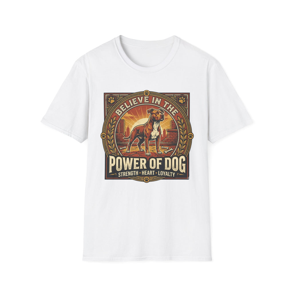 Believe in the Power of Dog Pitbull Cityscape T-Shirt in white, flat lay, featuring a retro-style badge graphic of a muscular brown and white Pitbull standing proudly before a warm urban cityscape at sunset, with text reading Believe in the Power of Dog and Strength, Heart, Loyalty.