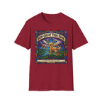 How Great Thou Bark Golden Retriever T-shirt flat lay, cardinal red shirt featuring a stained-glass style graphic of a golden retriever on a hilltop with sunbeams and the text 'How Great Thou Bark – A Hymn for the Devoted.'