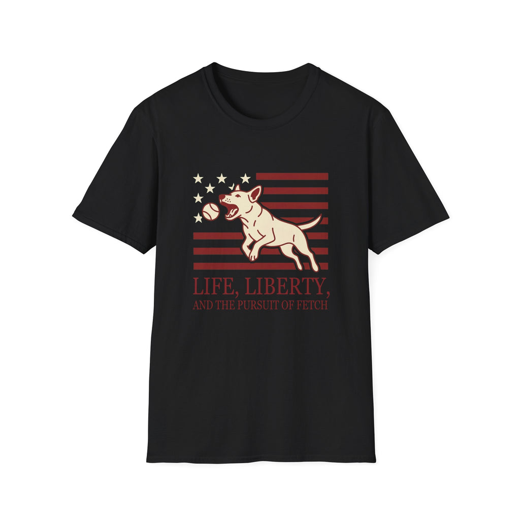 Pursuit of Fetch T-Shirt flat lay in black, featuring a leaping dog catching a tennis ball over a flag of red stripes and stars, with text reading 'Life, Liberty, and the Pursuit of Fetch.'