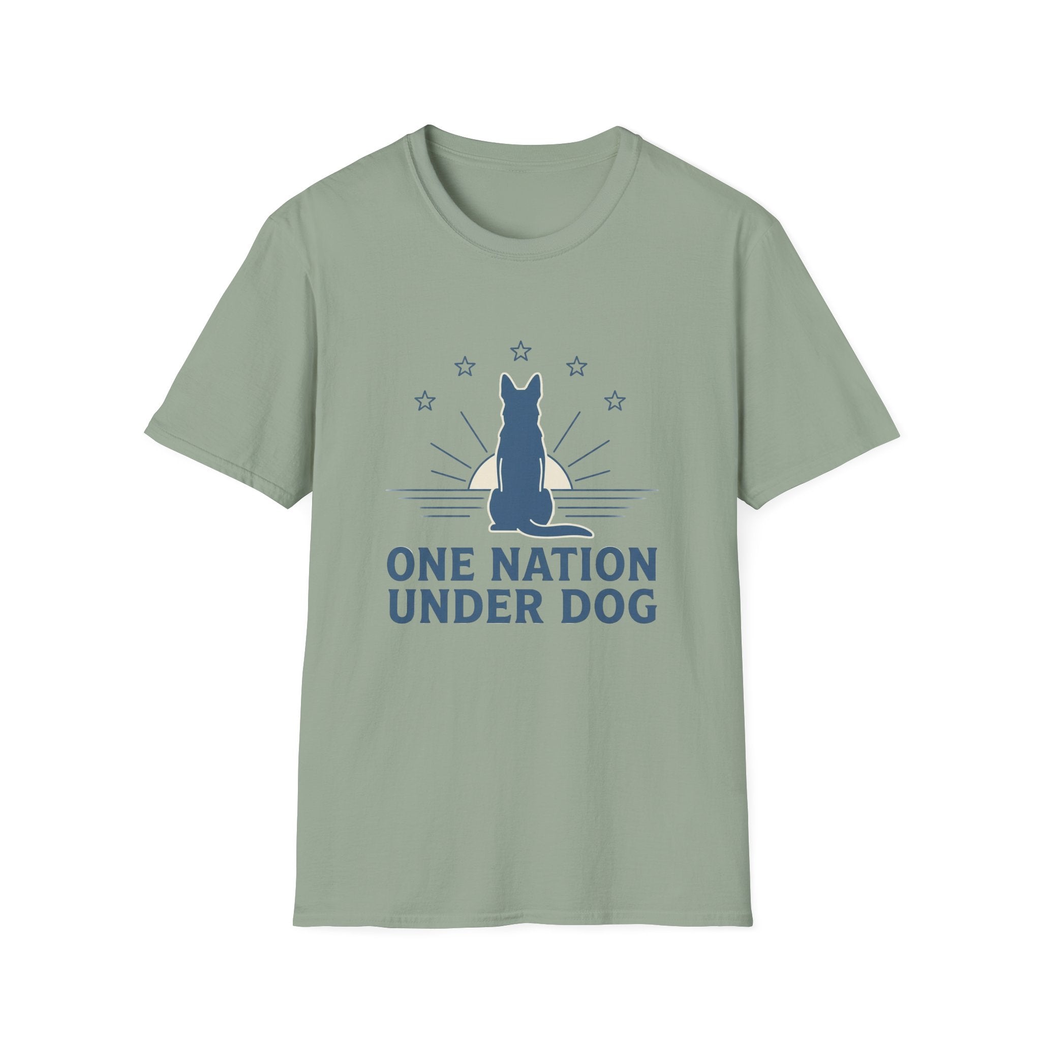 One Nation Under Dog T-Shirt flat lay in sage green, featuring a blue dog silhouette seated before a rising sun with rays and surrounding stars, with bold text reading 'One Nation Under Dog.'
