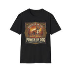Believe in the Power of Dog Pitbull Cityscape T-Shirt in black, flat lay, featuring a retro-style badge graphic of a muscular brown and white Pitbull standing proudly before a warm urban cityscape at sunset, with text reading Believe in the Power of Dog and Strength, Heart, Loyalty.