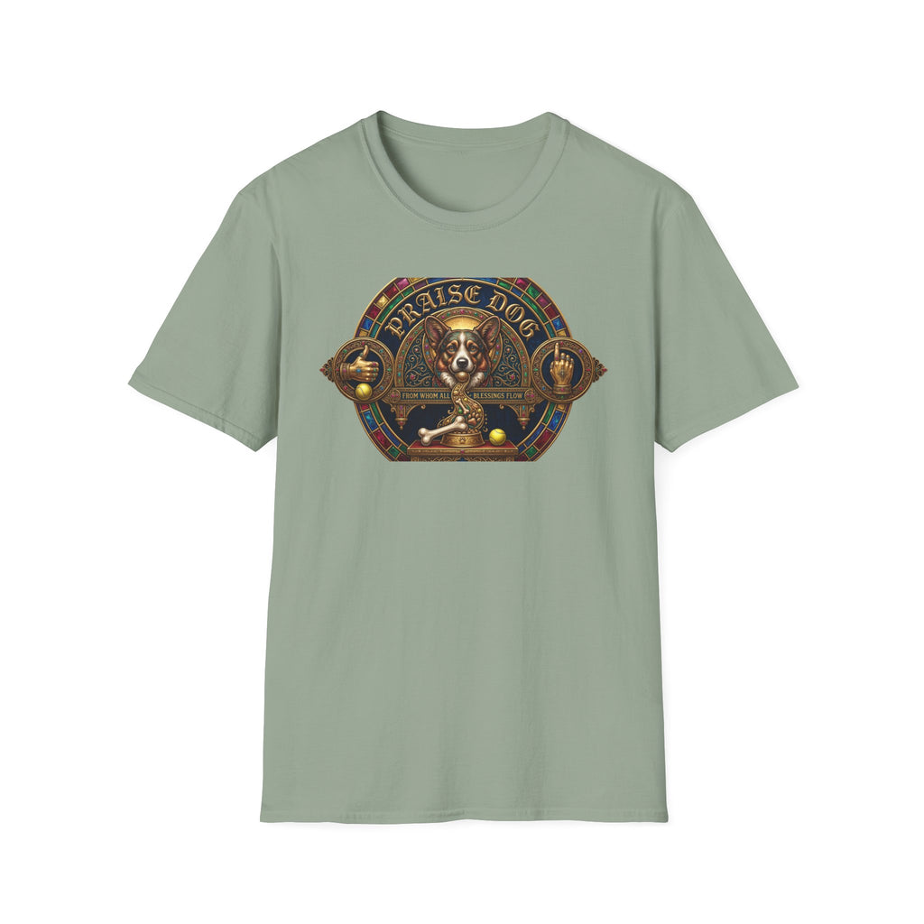 Praise Dog From Whom All Blessings Flow Corgi T-Shirt flat lay in sage green, featuring an ornate medieval stained-glass style graphic of a regal corgi seated in a jewel-encrusted octagonal frame with gold gothic lettering and dog bone and tennis ball accents.