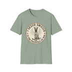 I Stand Amazed Belgian Malinois T-Shirt in sage green, flat lay front view featuring a vintage-style circular graphic of a Belgian Malinois with a halo, with the text 'I Stand Amazed in the Presence of Dog.'