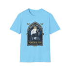 Believe in the Power of Dog Black Lab T-Shirt in light blue, flat lay view showing a gothic arch-framed graphic of a halo-wearing black Labrador standing under a full moon with a starry night sky, paw prints, crossed bones, and the words 'Strength Devotion Love'.