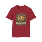 Believe in the Power of Dog T-shirt flat lay in cardinal red, featuring a vintage ornate badge graphic of a Labrador standing on a rocky mountain outcrop at sunset, with the text 'Believe in the Power of Dog' and 'Faith, Loyalty, Love'.
