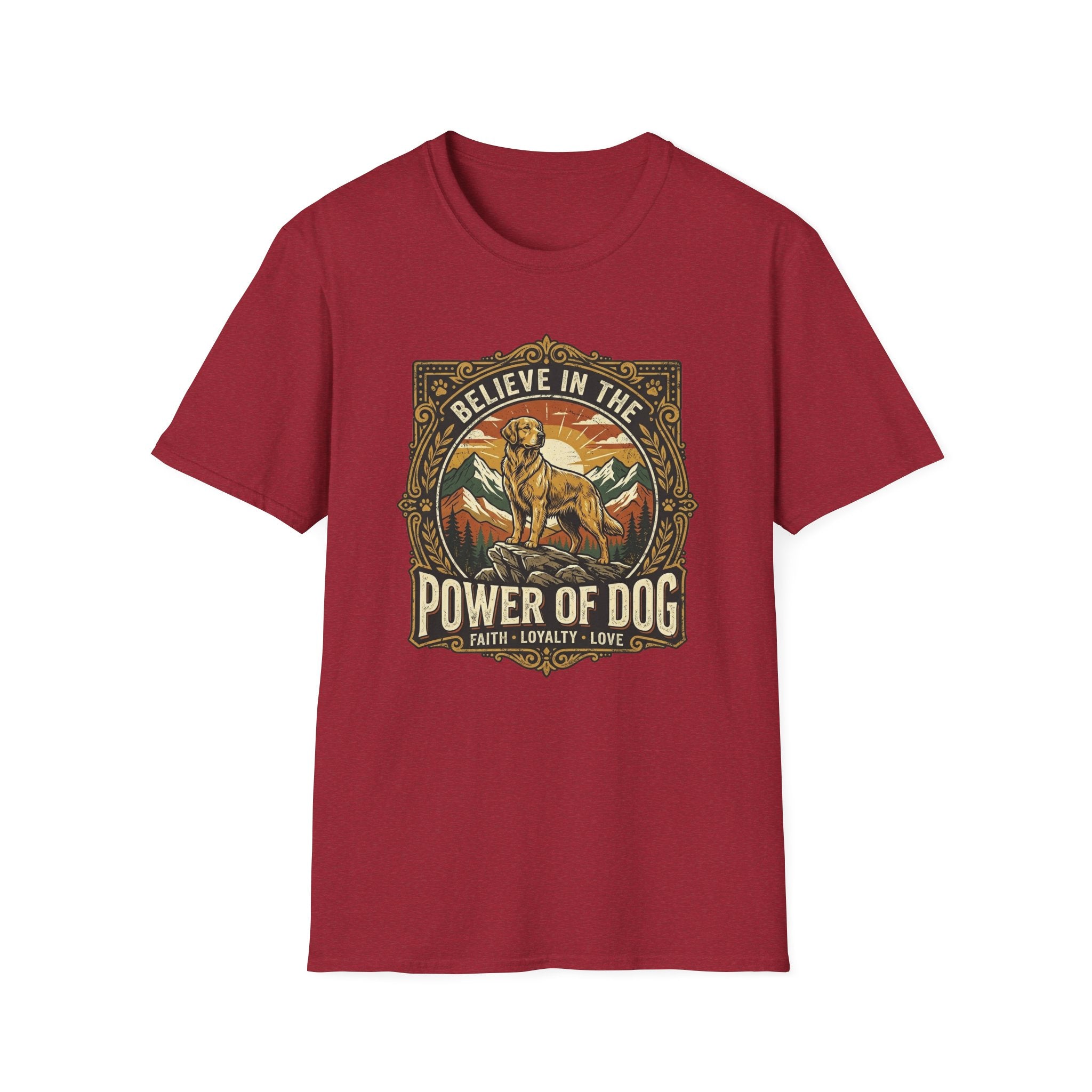 Believe in the Power of Dog T-shirt flat lay in cardinal red, featuring a vintage ornate badge graphic of a Labrador standing on a rocky mountain outcrop at sunset, with the text 'Believe in the Power of Dog' and 'Faith, Loyalty, Love'.