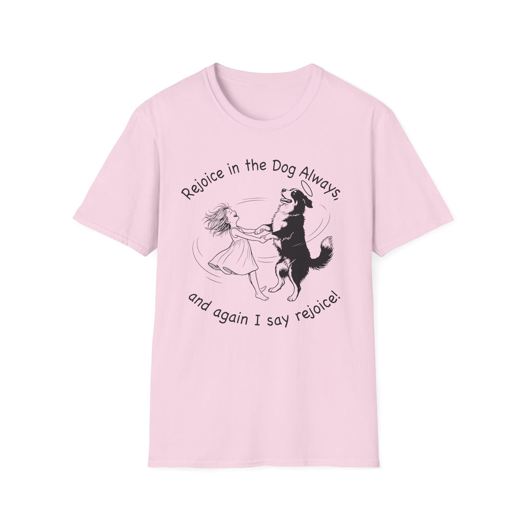 Rejoice in the Dog Lobo T-Shirt in light pink, flat lay mockup showing a woman joyfully dancing with a rearing black-and-white Border Collie line-art illustration and the text 'Rejoice in the Dog Always, and again I say rejoice!'