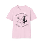 Rejoice in the Dog Lobo T-Shirt in light pink, flat lay mockup showing a woman joyfully dancing with a rearing black-and-white Border Collie line-art illustration and the text 'Rejoice in the Dog Always, and again I say rejoice!'