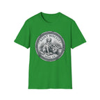 Saint Biscuit Heal Us T-shirt flat lay in green, featuring a vintage-style medallion graphic of a golden retriever dog watching over a reclining figure with the text 'Saint Biscuit Heal Us'.