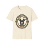 What Would Dog Do T-Shirt flat lay on natural cream shirt featuring an ornate vintage frame design with a halo-wearing black and white pit bull and the text What Would Dog Do? WWDD.