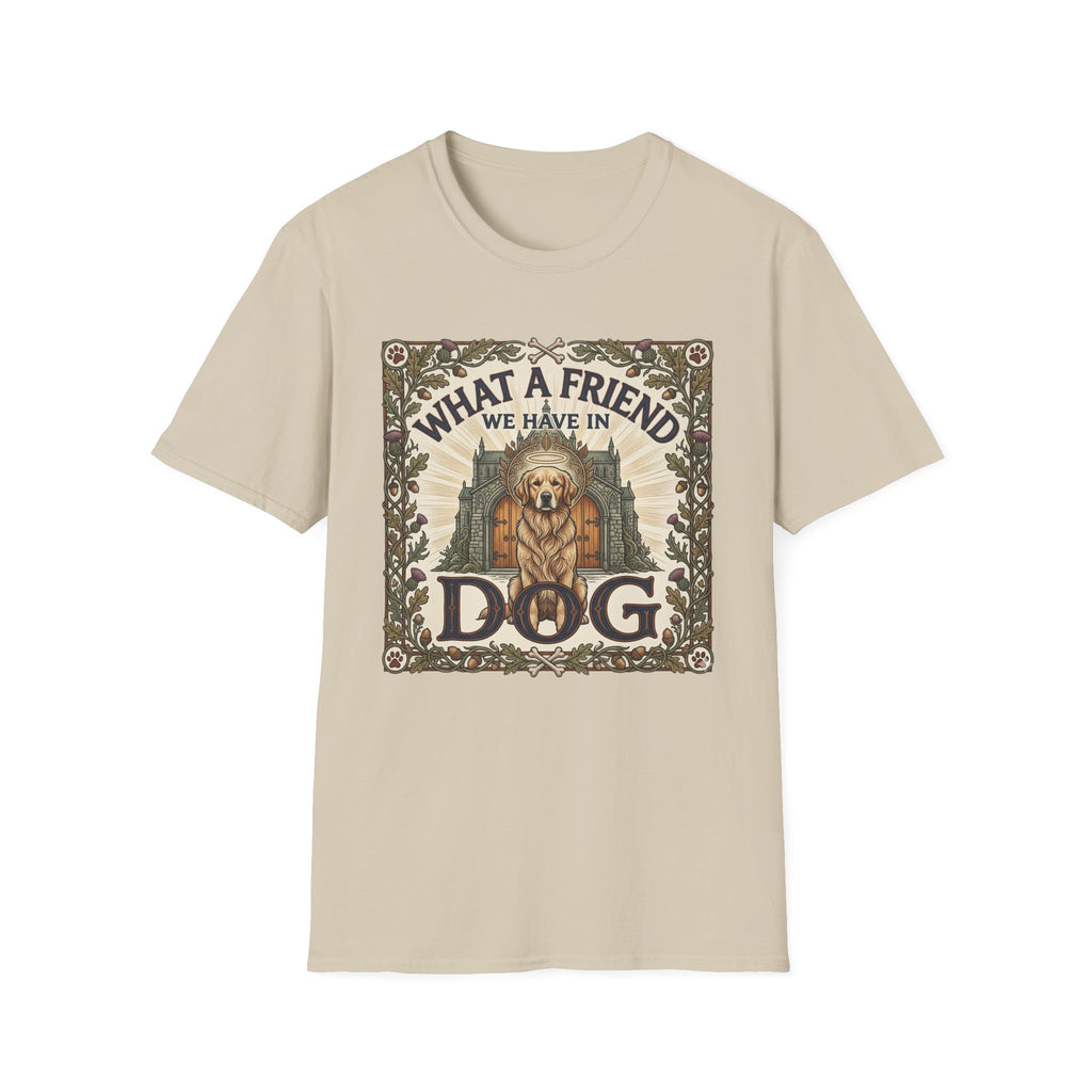 What a Friend We Have in Dog T-Shirt flat lay, natural tan shirt featuring a vintage botanical-framed graphic of a golden retriever with a halo seated before a cathedral archway with the text 'What a Friend We Have in Dog.'