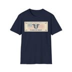 In Dog We Trust Bill T-Shirt flat lay in navy, featuring a currency-style graphic of a dog portrait with a halo set against a vintage American flag, printed with the text 'In Dog We Trust.'