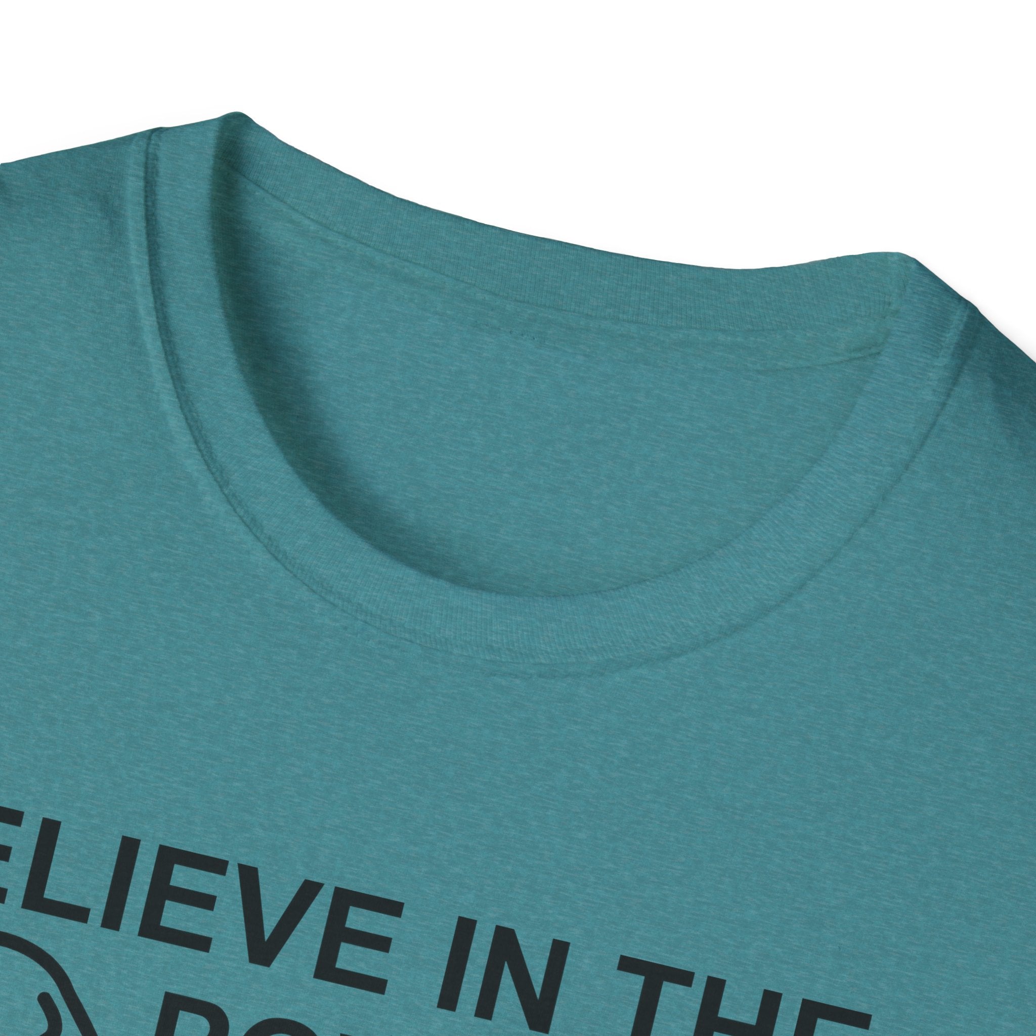 Believe in the Power of Dog T-Shirt close-up detail in heather teal, showing the top portion of the graphic with dog outline and the words Believe in the Power.