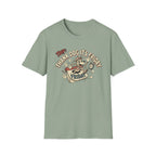 Thank Dog It's Friday T-Shirt flat lay on sage green shirt featuring a retro cartoon dog leaping through a Friday calendar page with TDIF: Thank Dog It's Friday text.