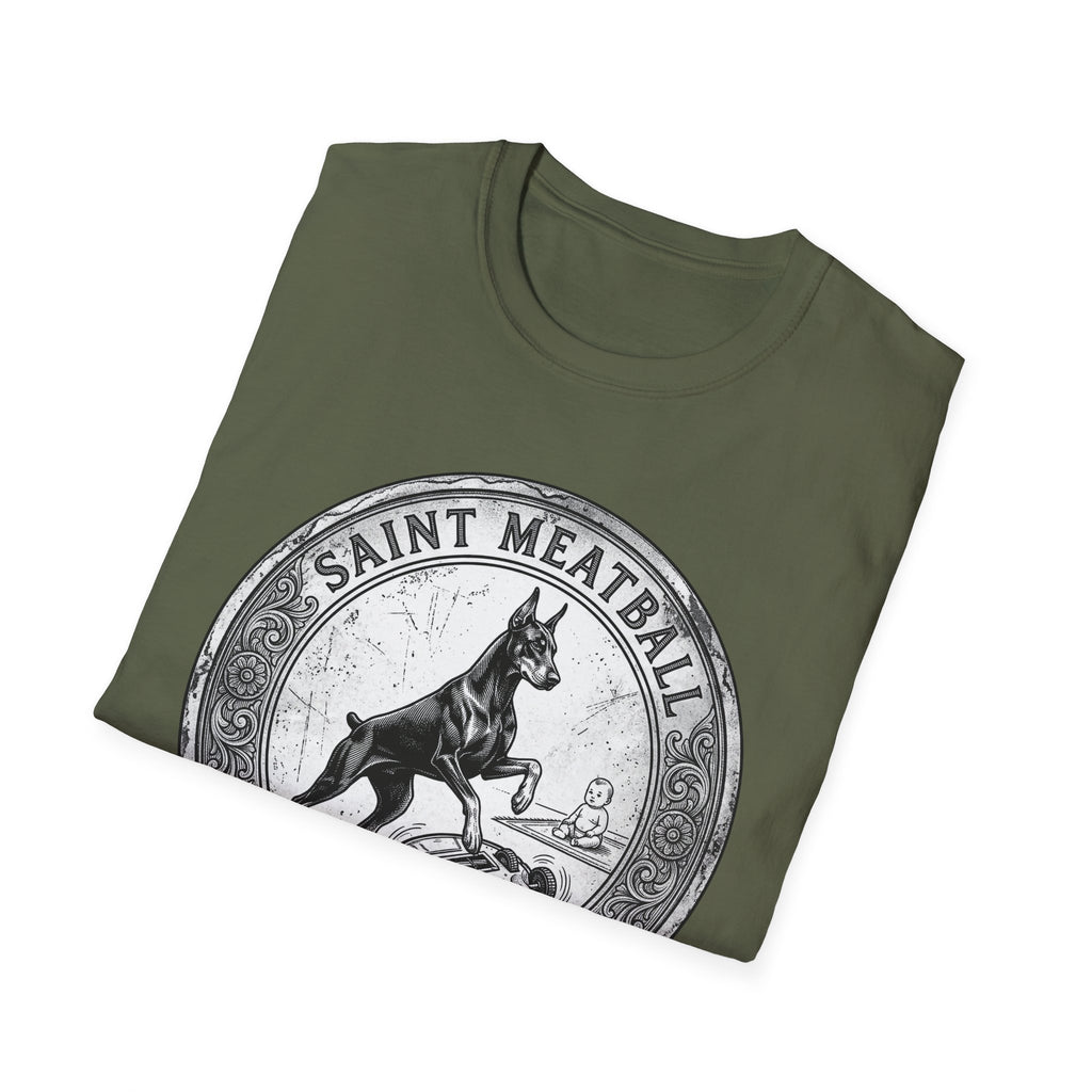 Saint Meatball Defend Us T-Shirt folded flat lay on military green shirt showing the Doberman saint medallion design.