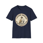 I Stand Amazed Great Dane T-Shirt flat lay in navy, featuring a circular vintage-style graphic of a towering Great Dane with a halo and a small human figure, with text "I Stand Amazed in the Presence of Dog."