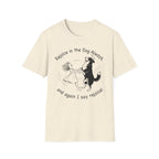 Rejoice in the Dog Lobo T-Shirt in natural cream, flat lay mockup showing a woman joyfully dancing with a rearing black-and-white Border Collie line-art illustration and the text 'Rejoice in the Dog Always, and again I say rejoice!'