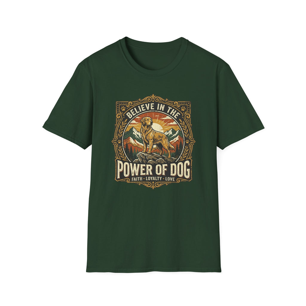 Believe in the Power of Dog T-shirt flat lay in forest green, featuring a vintage ornate badge graphic of a Labrador standing on a rocky mountain outcrop at sunset, with the text 'Believe in the Power of Dog' and 'Faith, Loyalty, Love'.