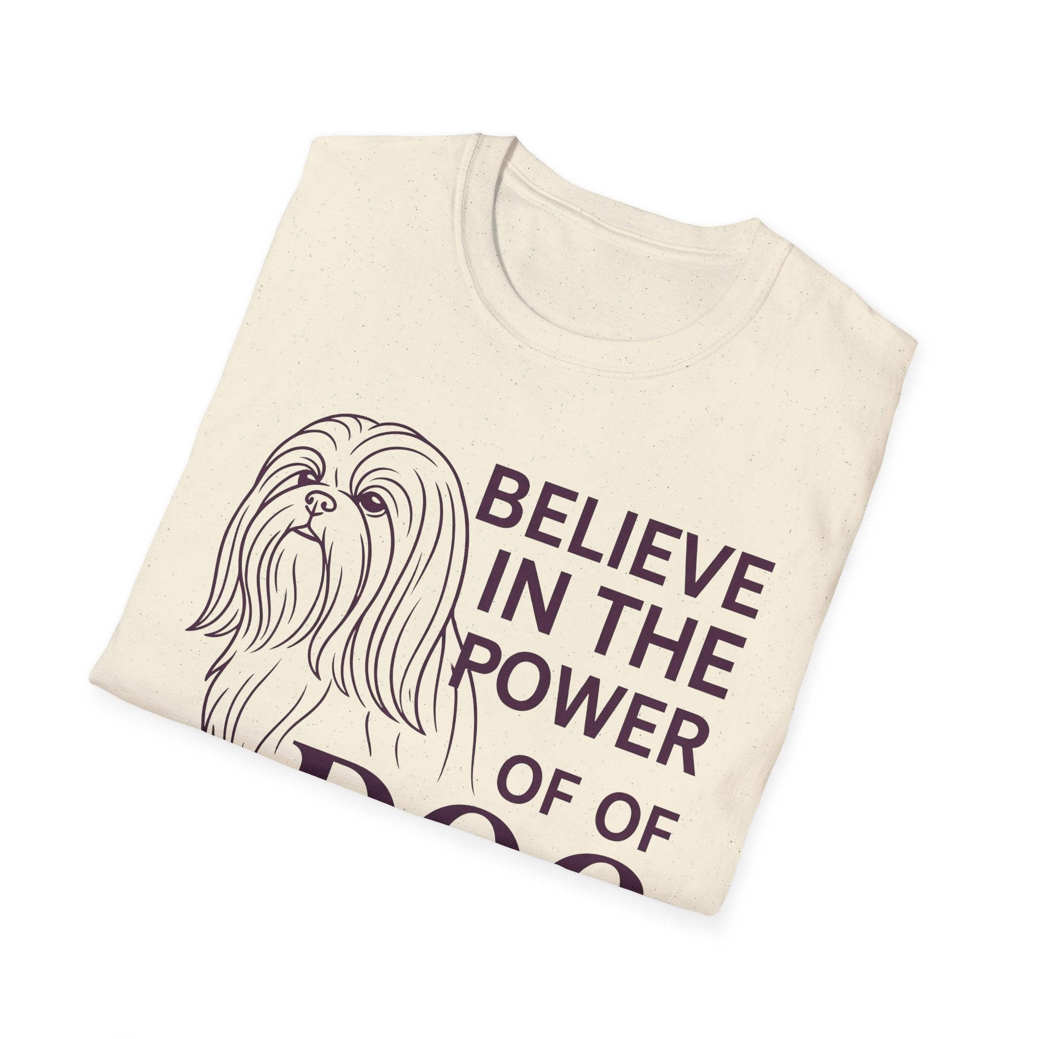 Believe in the Power of Dog Shih Tzu Line Art T-Shirt in natural cream, folded flat lay showing the Shih Tzu line art and Believe in the Power of Dog text.