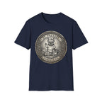 Saint Pretzel Forgive Us T-Shirt flat lay on navy blue shirt featuring an engraved medallion design with a French Bulldog saint, a squirrel, and a raccoon, reading St. Pretzel Forgive Us.