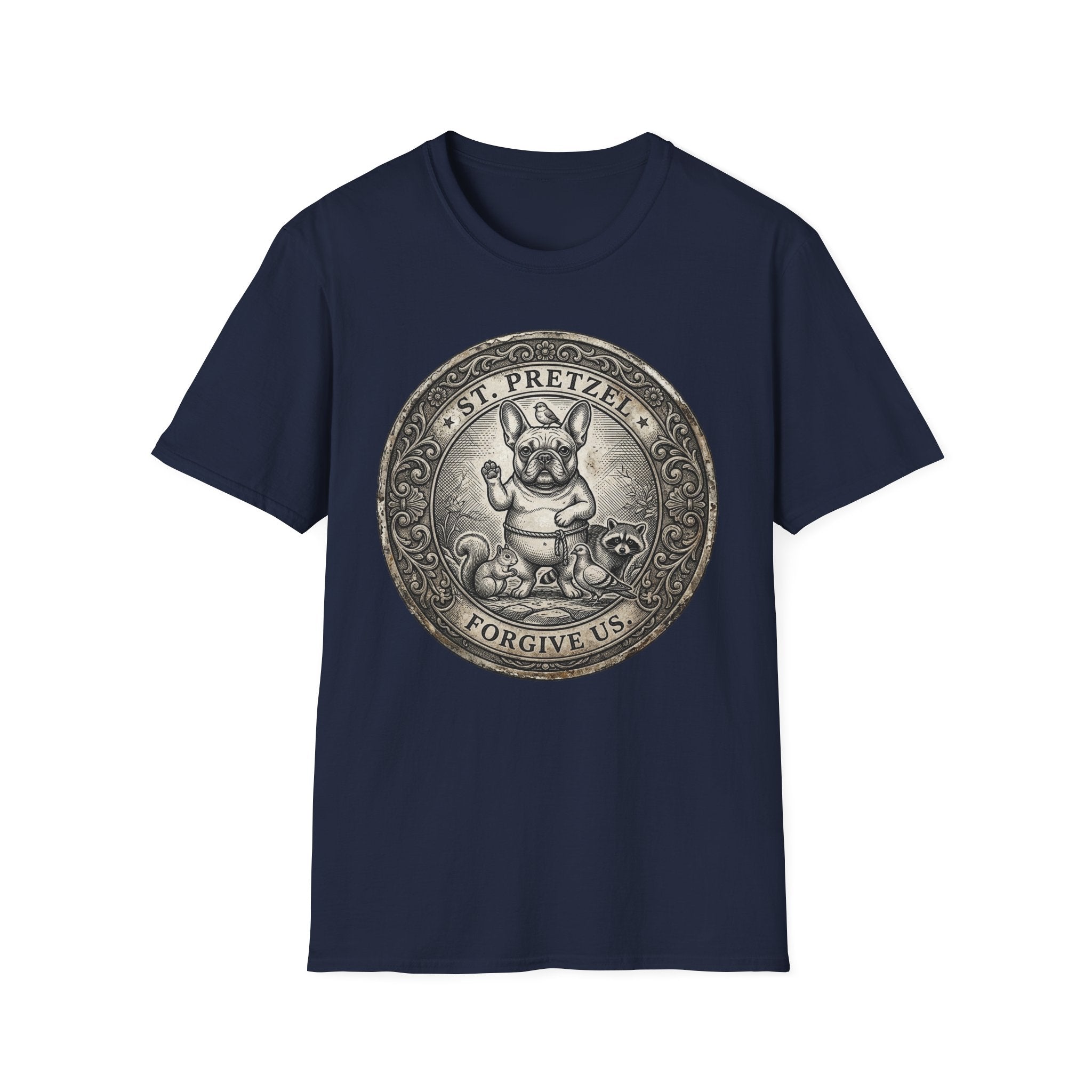 Saint Pretzel Forgive Us T-Shirt flat lay on navy blue shirt featuring an engraved medallion design with a French Bulldog saint, a squirrel, and a raccoon, reading St. Pretzel Forgive Us.