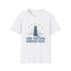 One Nation Under Dog T-Shirt flat lay in white, featuring a blue dog silhouette seated before a rising sun with rays and surrounding stars, with bold text reading 'One Nation Under Dog.'