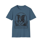 Holy Orders | Border Collie T-Shirt flat lay on navy shirt featuring a stained glass style illustration of a Border Collie depicted as a holy figure with a golden halo and the text 'Holy Orders.'