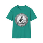 Saint Meatball Defend Us T-Shirt flat lay on teal shirt featuring a vintage medallion design with a Doberman Pinscher saint and the text Saint Meatball Defend Us.
