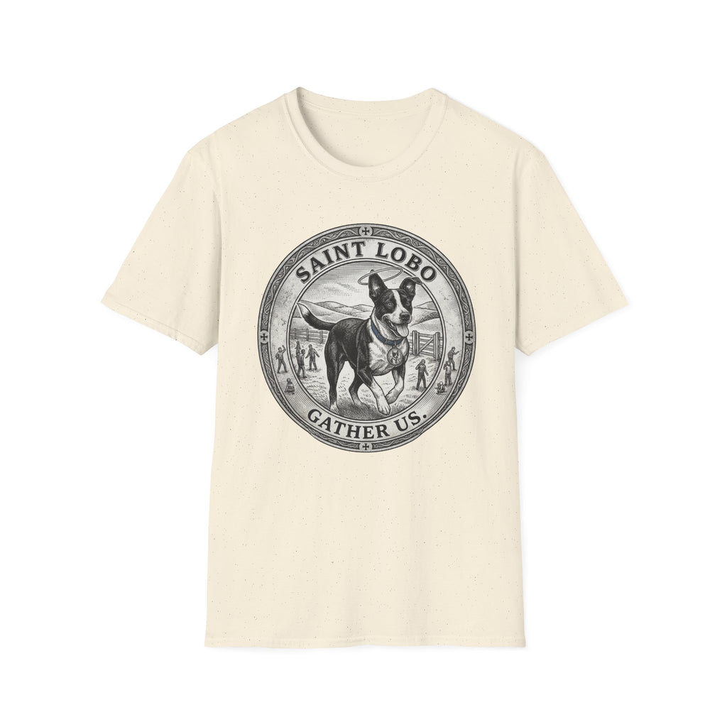 Saint Lobo Gather Us T-Shirt flat lay in natural/cream, featuring a vintage medallion graphic of a leaping border collie-style dog with a halo, surrounded by the text 'Saint Lobo — Gather Us.'