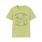 Rejoice in the Dog Rhodesian Ridgeback T-Shirt in lime green, flat lay mockup showing a woman joyfully dancing with a rearing Rhodesian Ridgeback line-art illustration and the text 'Rejoice in the Dog Always, and again I say rejoice!'