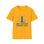 One Nation Under Dog T-Shirt flat lay in gold yellow, featuring a blue dog silhouette seated before a rising sun with rays and surrounding stars, with bold text reading 'One Nation Under Dog.'
